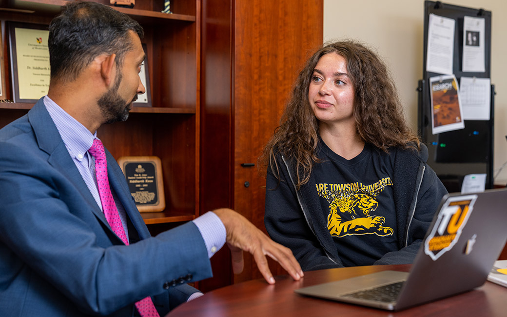 Graduate Student talking with advisor