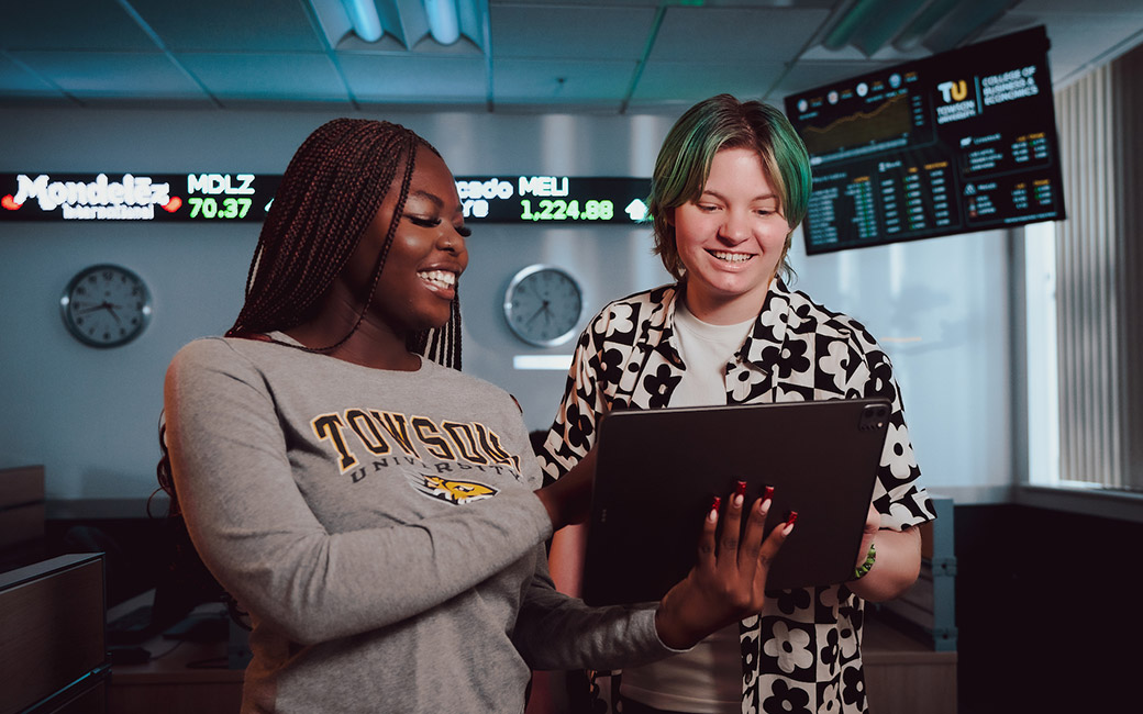 Students posing in the finance lab