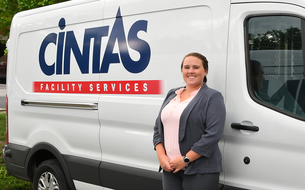 Jillian standing next to a Cintas truck Jillian standing next to a Cintas truck