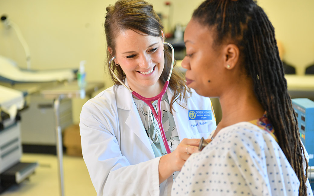 Katie Kasmer and a patient