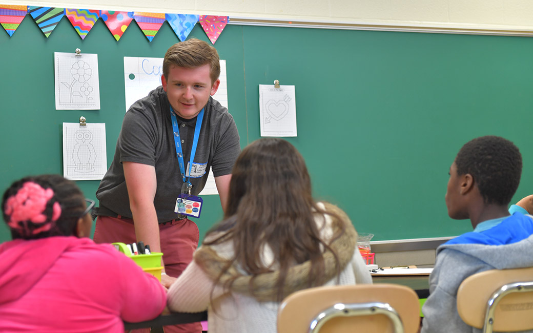 Colby Cronise and students in class