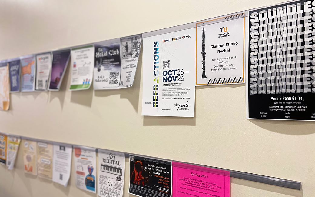 A row of hung up flyers line a CFA wall