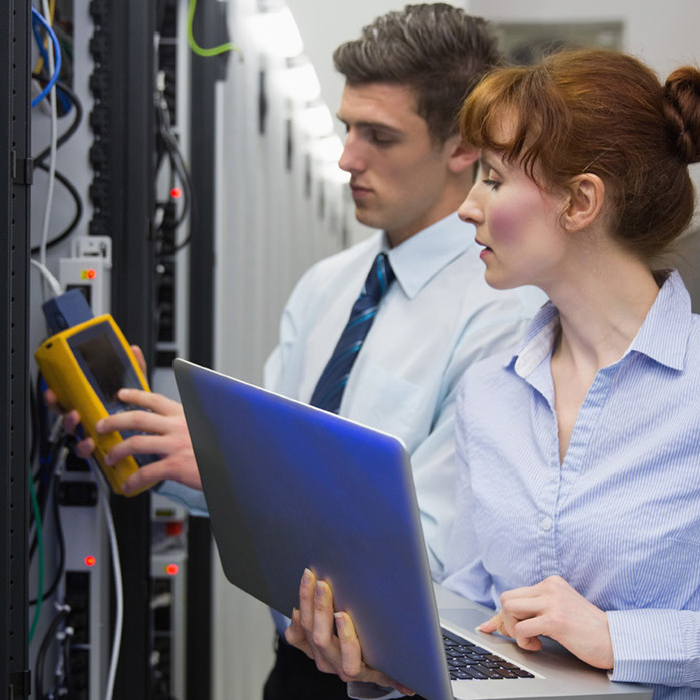 two it network professionals working