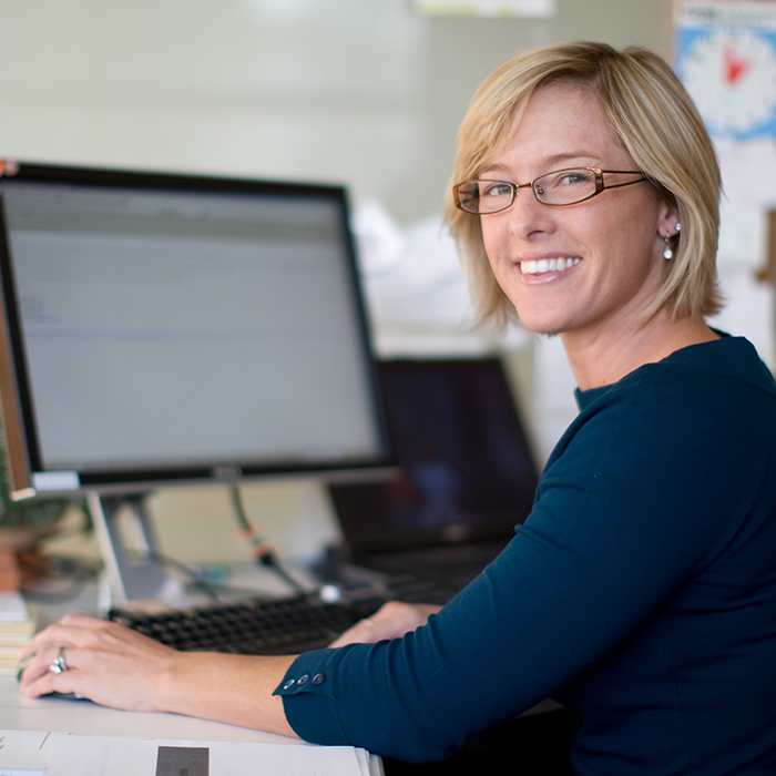 Employee working at her desktop