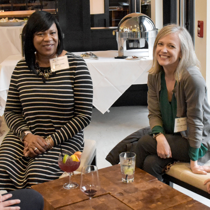 Women's Leadership graduates at a happy hour