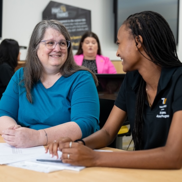 Faculty director Cundy Ghent with a scholar