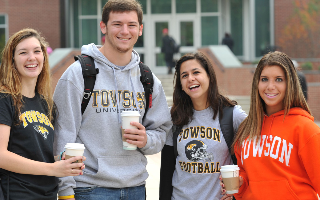 TU students standing in front of Cook Library