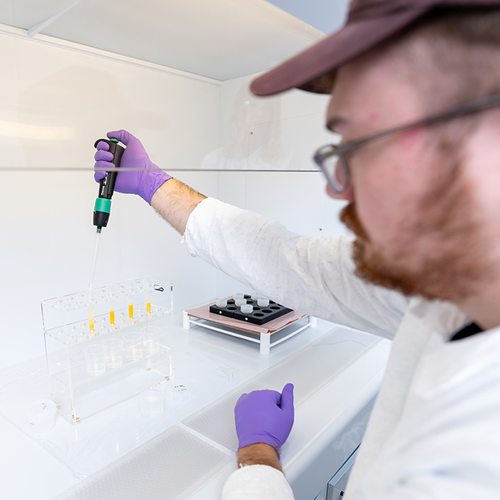 Zachary Greenwald performing anion chromatography to isolate Re for analysis