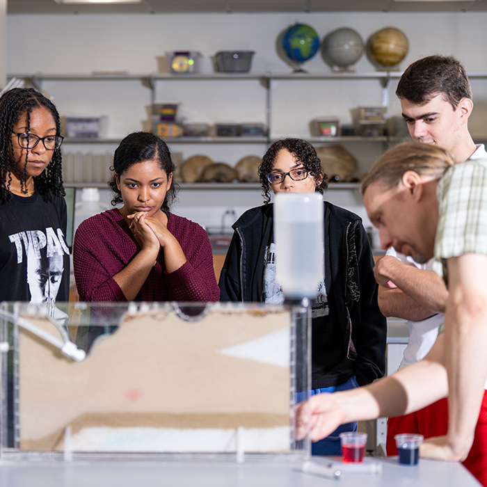 Students observing groundwater model