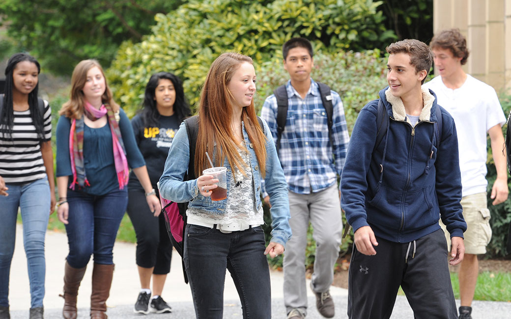 students walking on campus