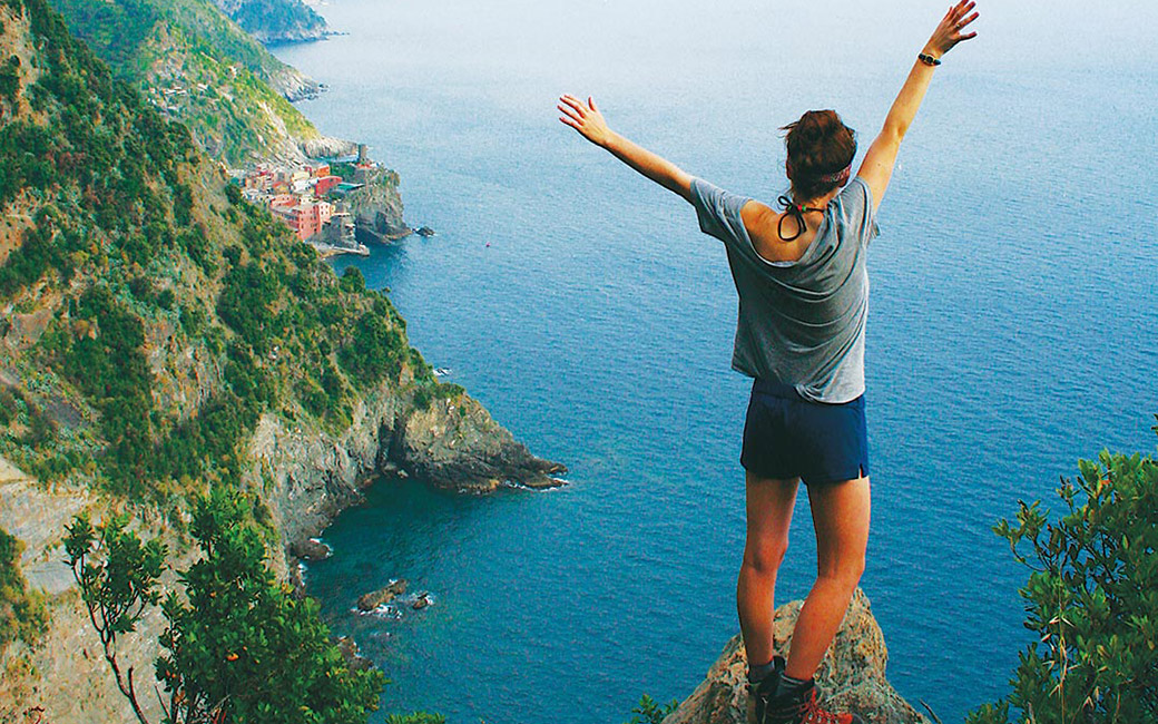 student on a cliff