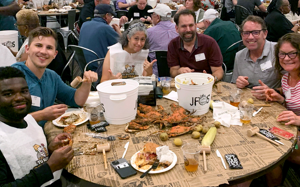 A group of people picking crabs