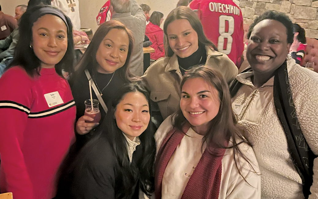 Guests enjoy happy hour before the Caps game.