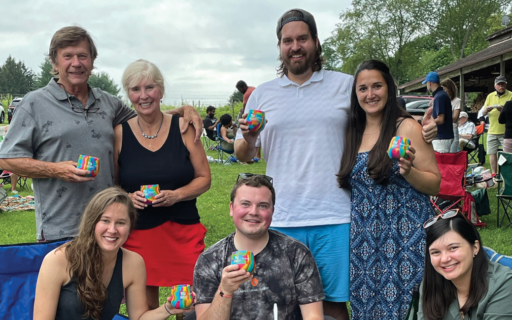Standing: Bill and Linda Slemp, Tom Slemp ’14 and Courtney Smith ’12  Sitting: Laura Slemp ’15; Ben Crull ’17, ’20; and Jessica Wolfe ’20