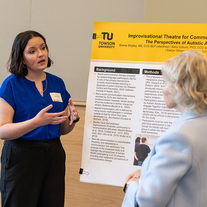 PhD student presenting research
