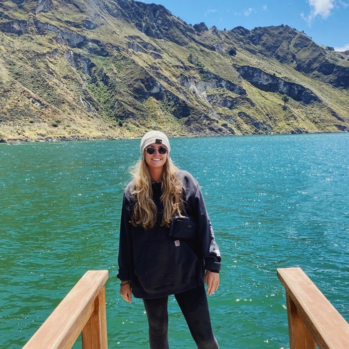 Woman standing in front of water