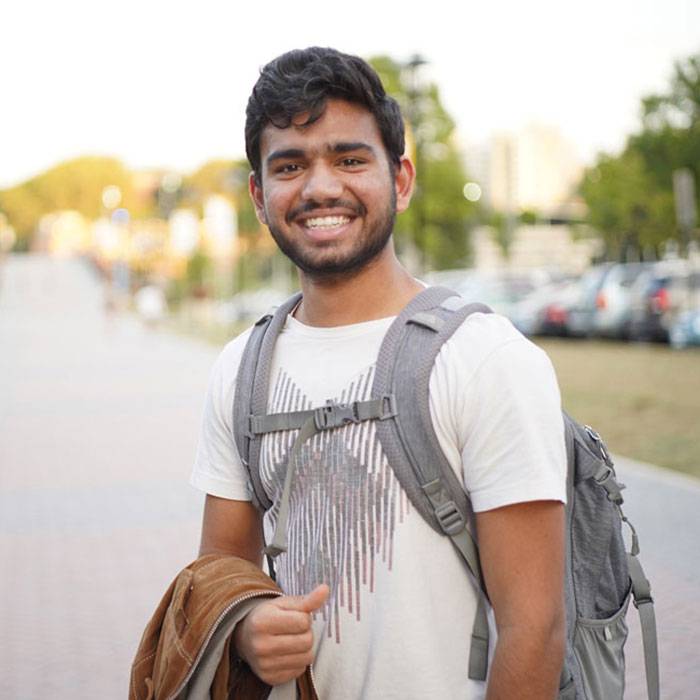student outside on campus