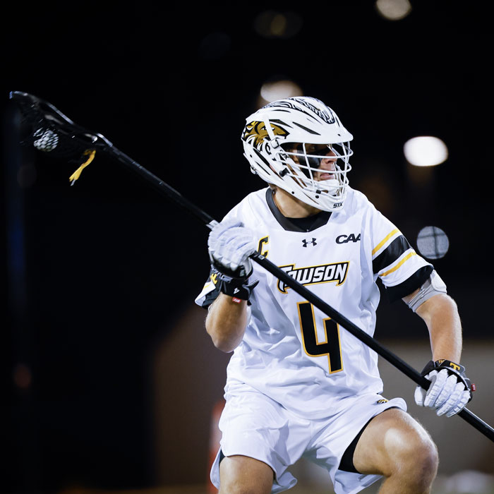 Conor Spagnolli gears up to throw the ball during the CAA Championship game