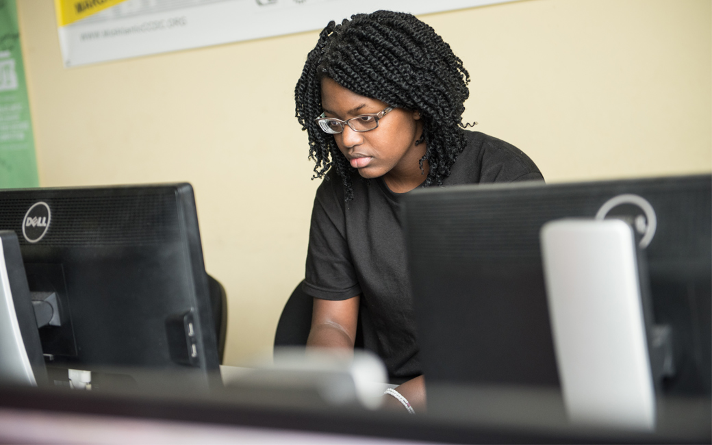 Student at computers, cybersecurity 