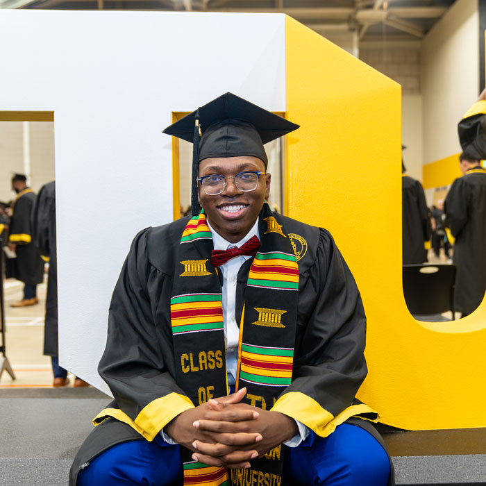 Graduate Daniel Olofi