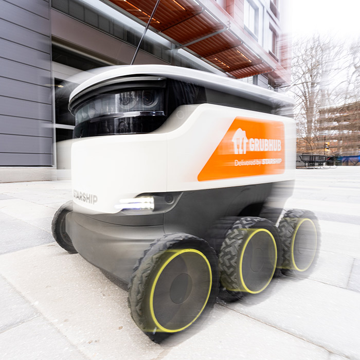 A food delivery robot in motion