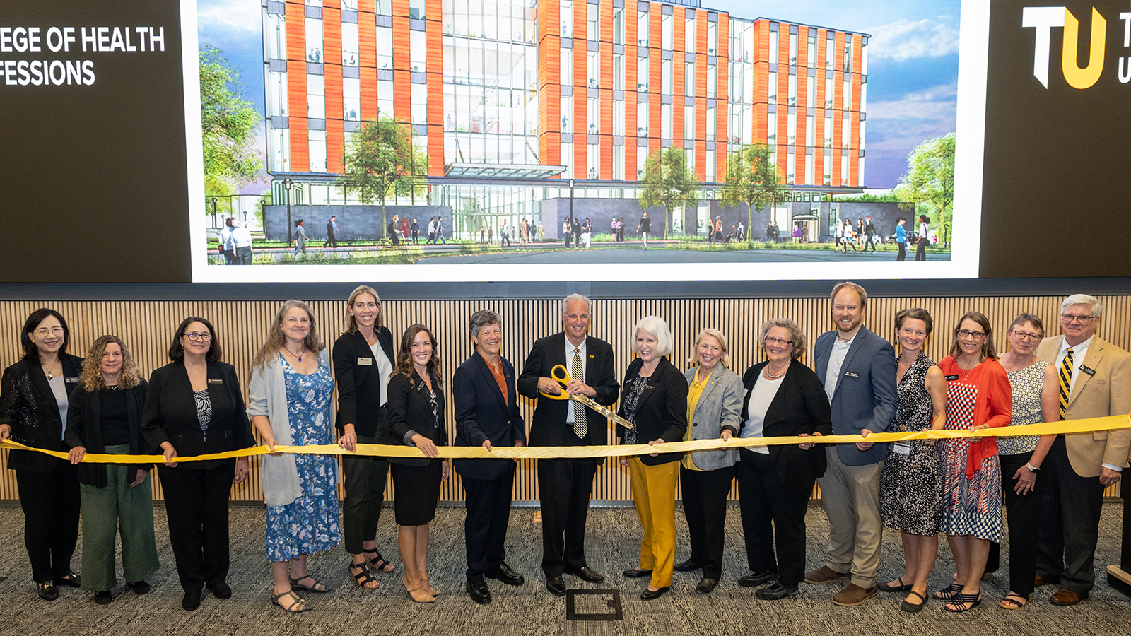 ribbon cutting at new health professions building