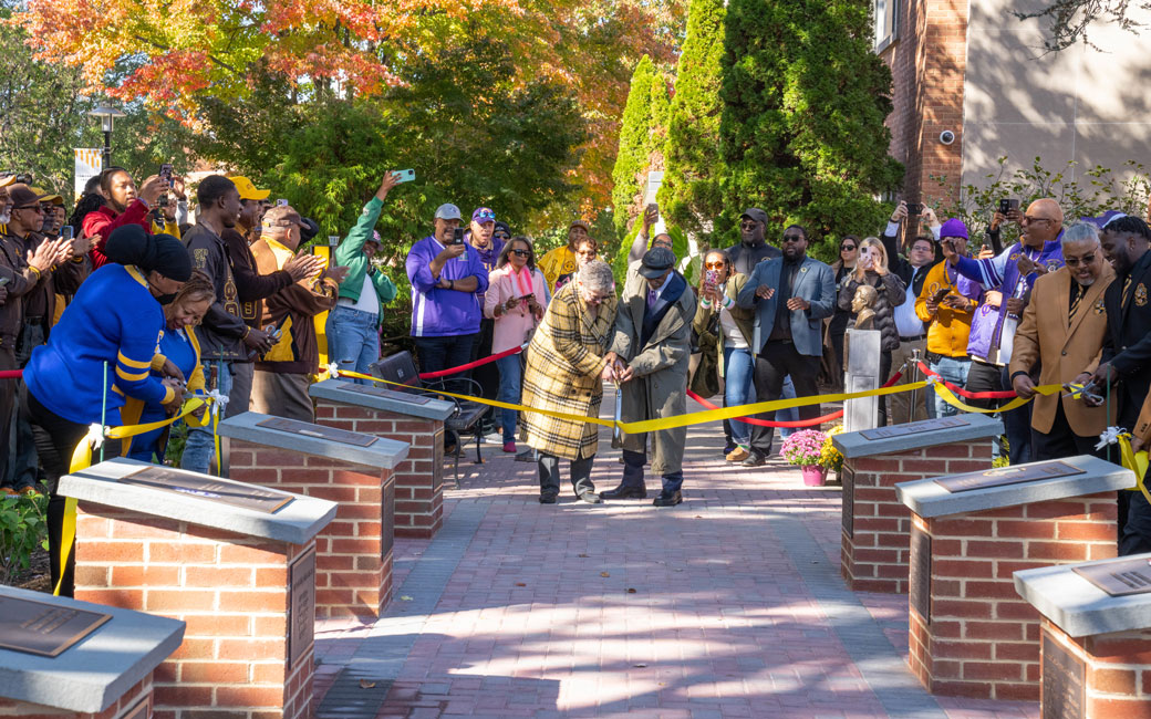 The ribbon cutting at NPHC Tribute in Chapman Quad