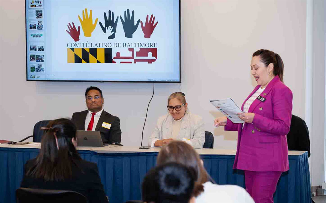 Woman presenting at a conference