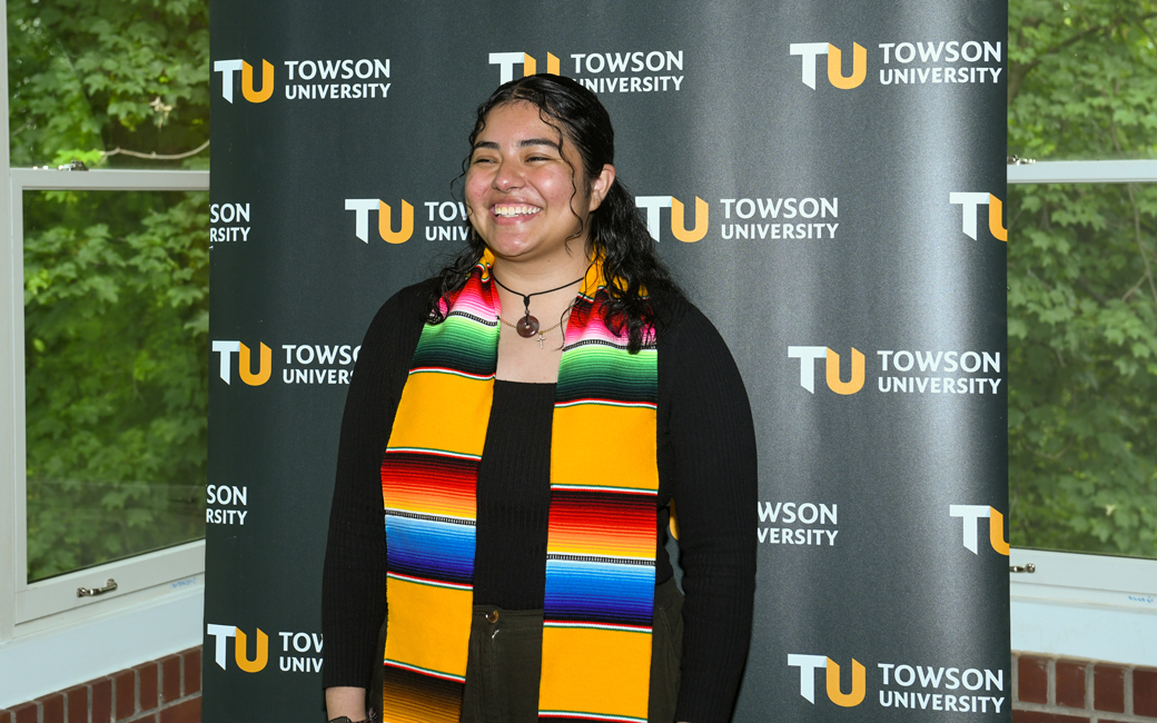 Student wearing latine/x stole