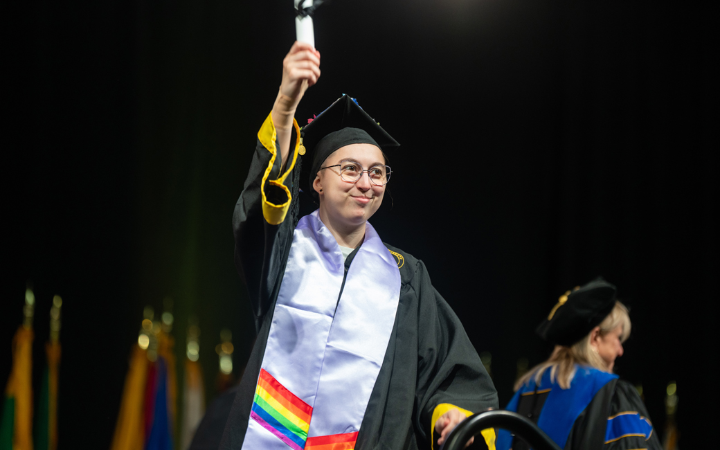 Student wearing a stole from the lavender celebration