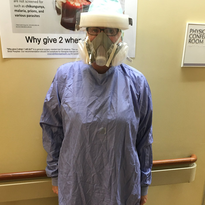 Teresa Nikstaitis in full COVID-19 PPE.