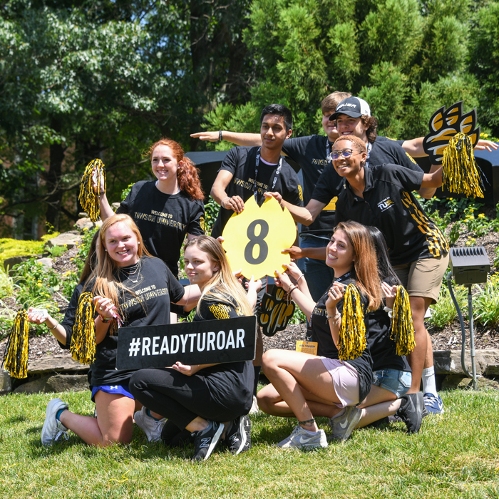 Student orientation leaders showing TU pride