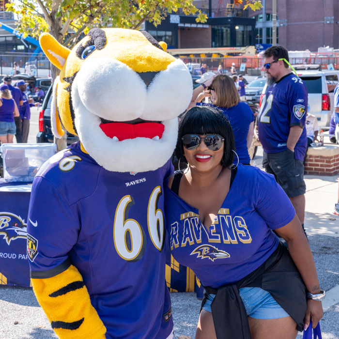 Doc Posing With a Ravens Fan