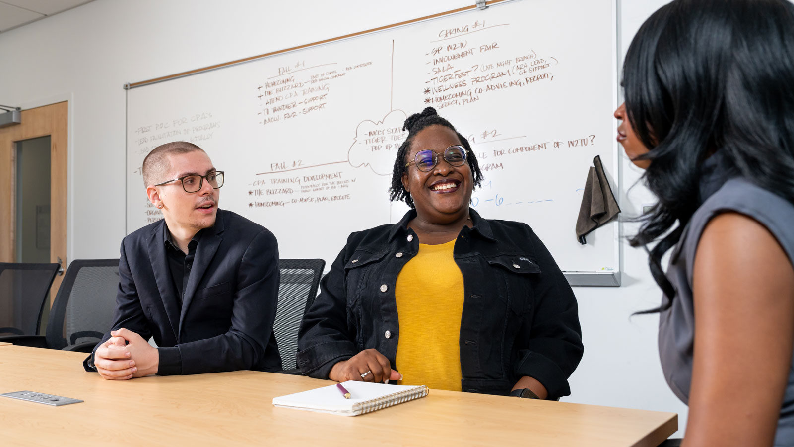 Carolyn Harris talking with the SGA president and VP