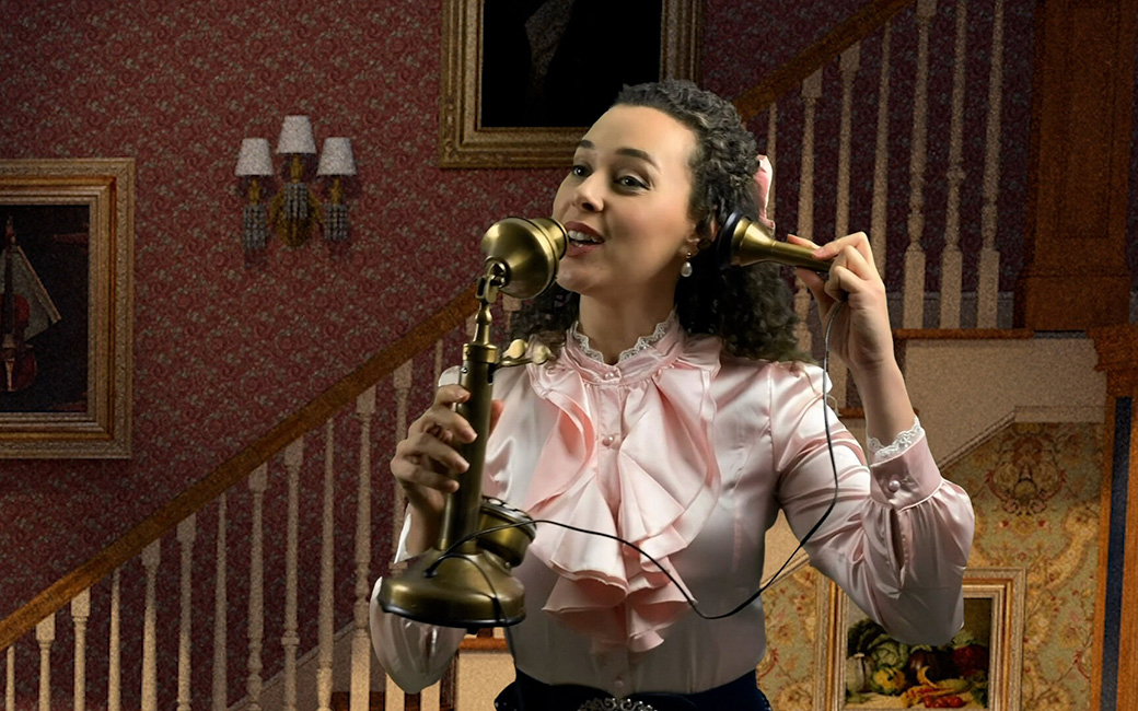 Shereen Ahmed as Esther Smith in front of painted background