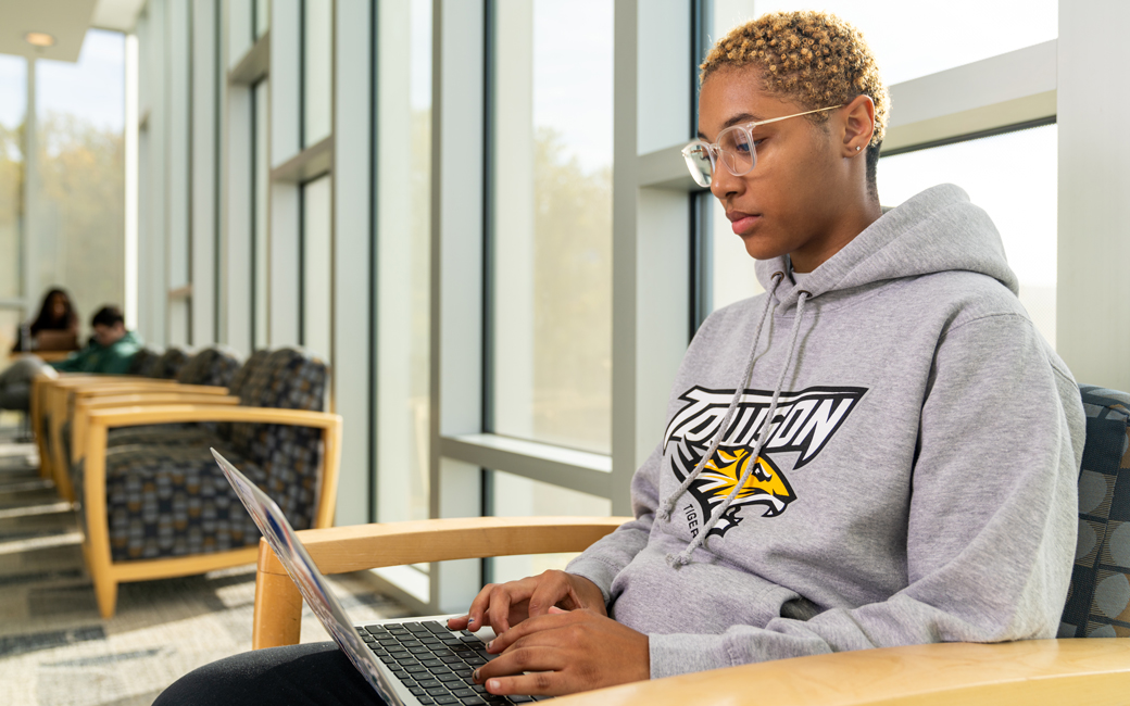 Shilah Bremond working on a project on campus