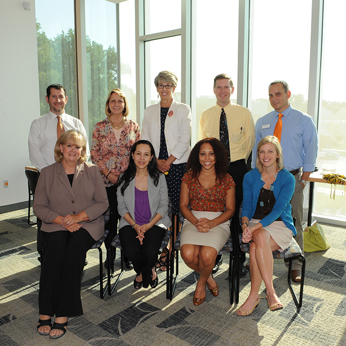 TU staff members posed together
