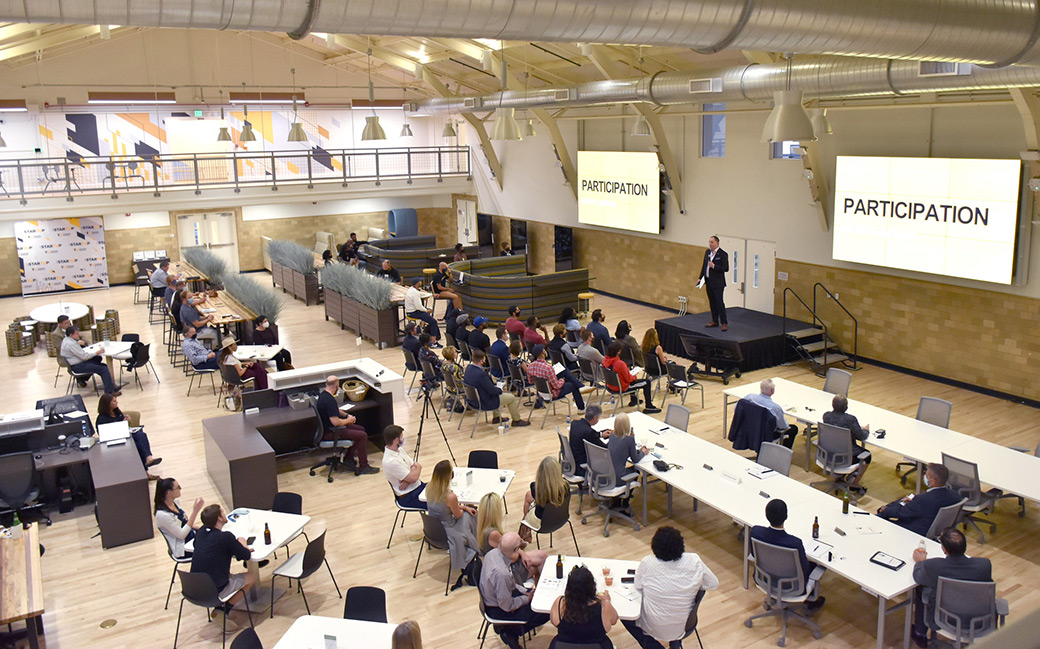 Presenter speak to audience viewed from above