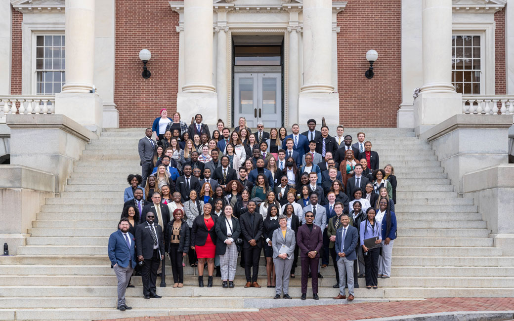 Group posing on building steps