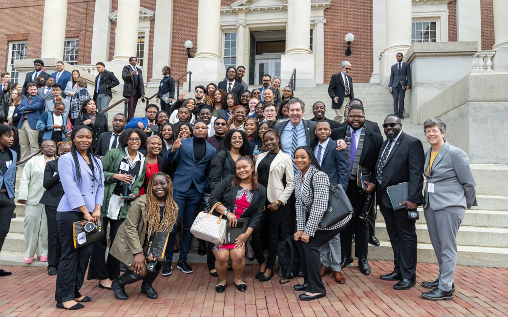 Towson students pose with Baltimore County Executive John Olszewski