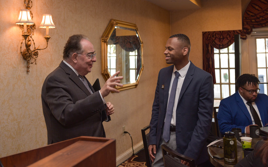 USM Chancellor Jay Perman meets with a student during Tiger Pride Day. 