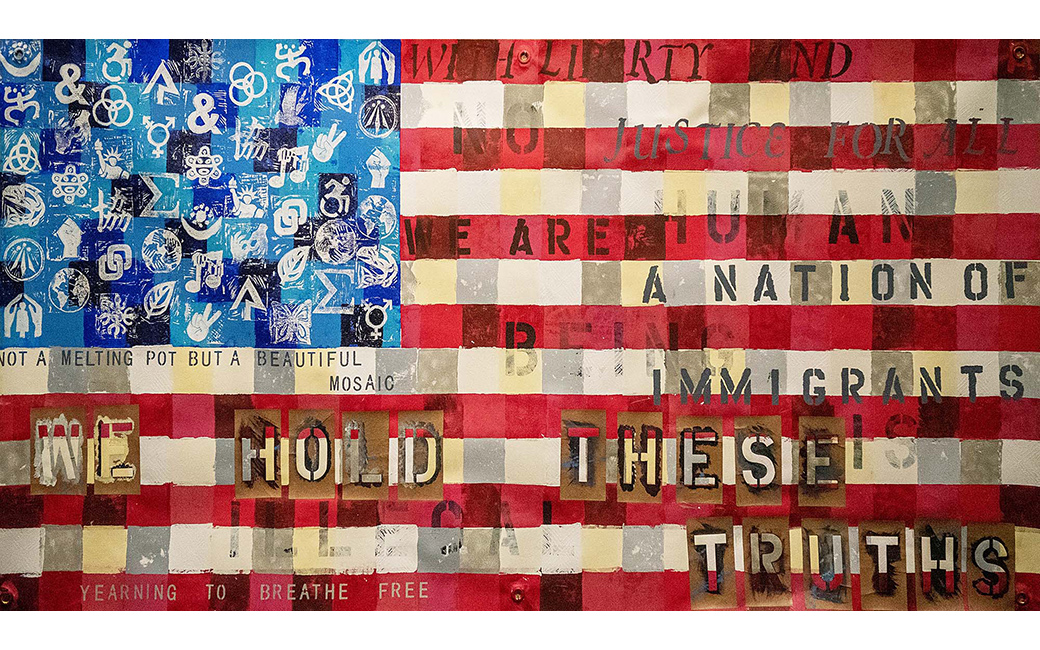 Full image of flag artwork with patchwork paint and stencils, stamp work