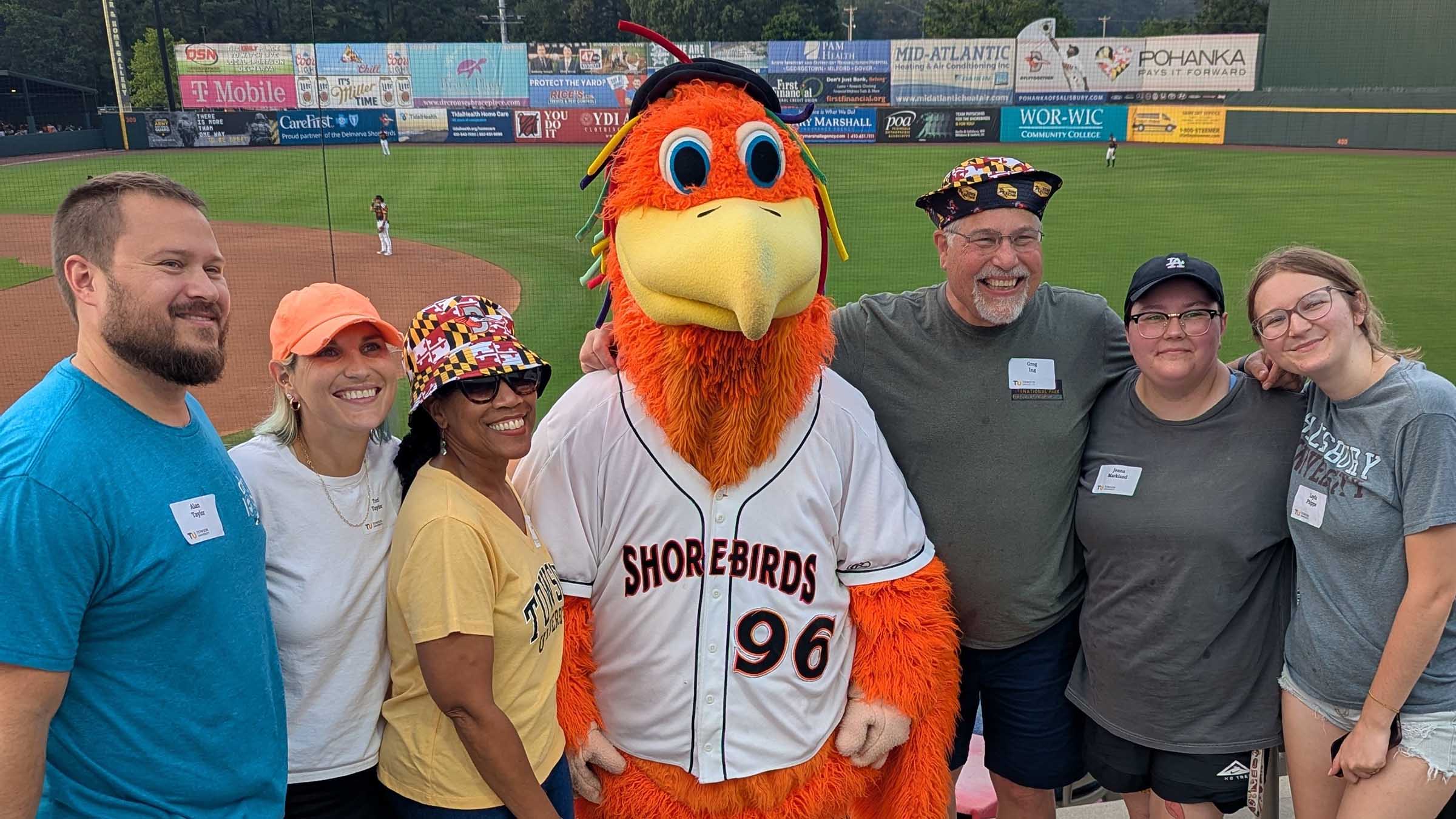 Alan Taylor, Tori Taylor, Edna Primrose ’84, Sherman the Shorebird, Greg Ing, Jenna Markland and Layla Phipps at the Shorebirds game