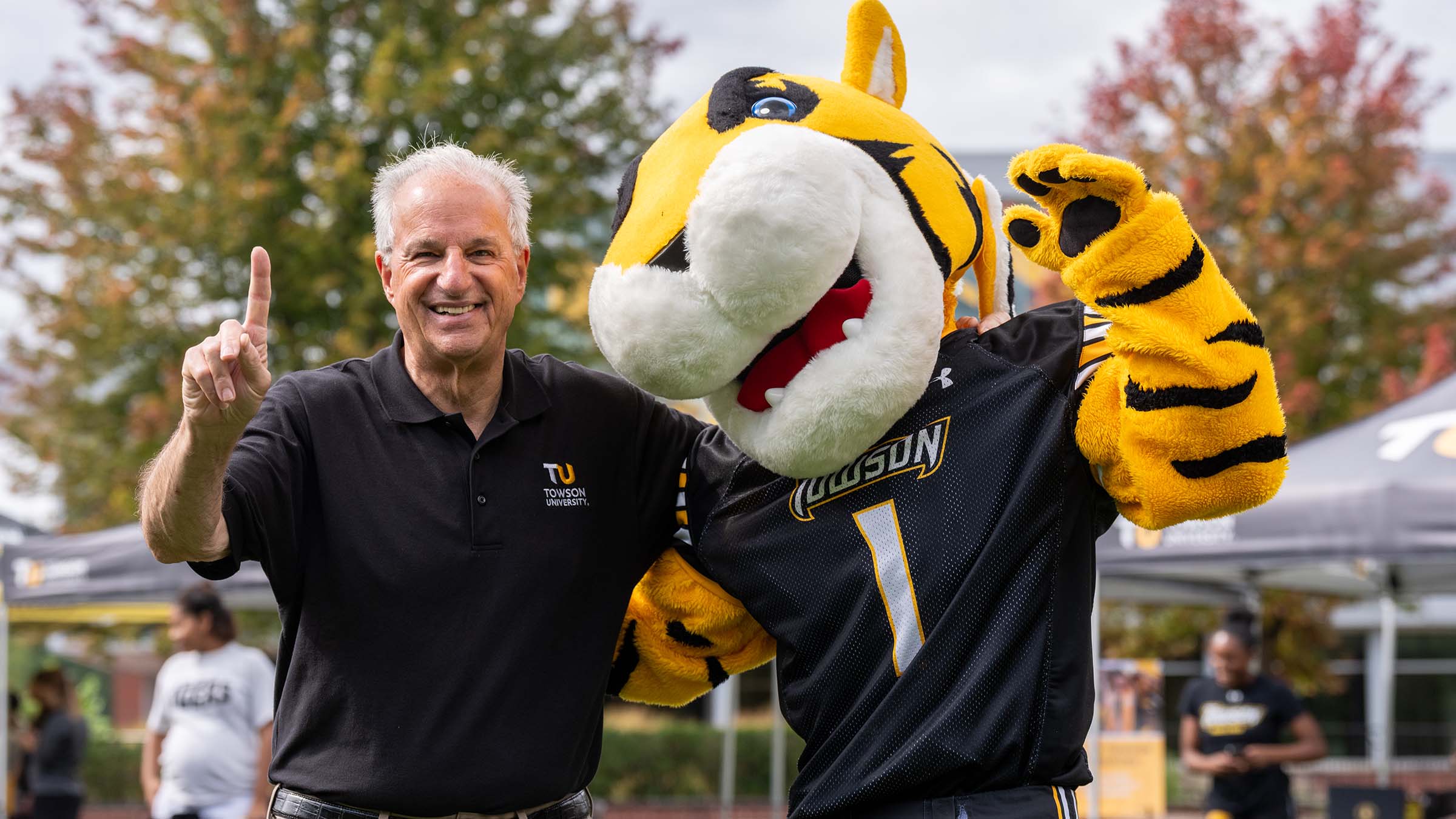 President Mark Ginsberg and mascot Doc