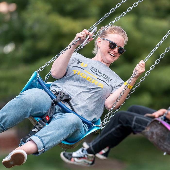 TU student on a swing