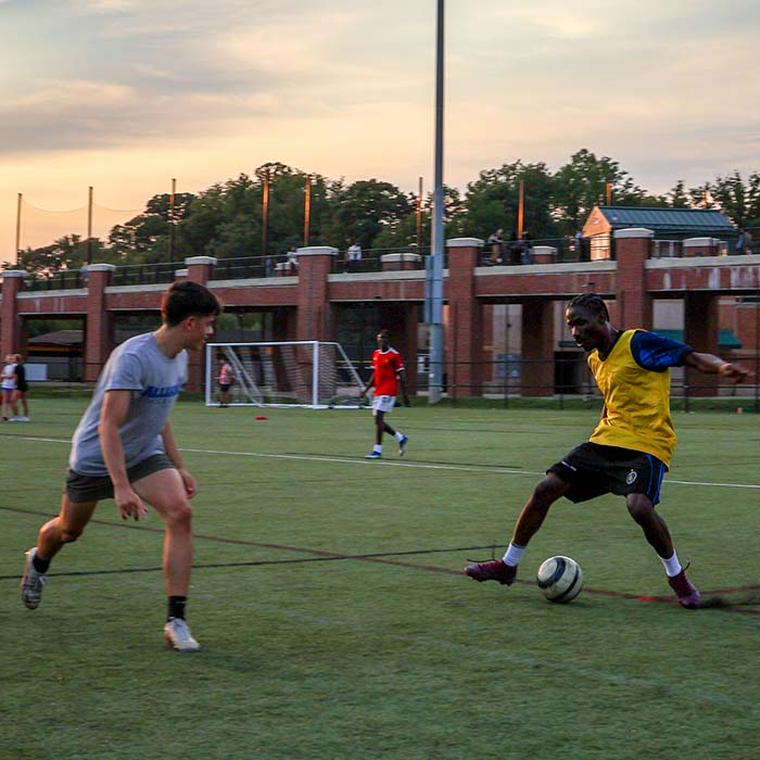 Students playing soccer