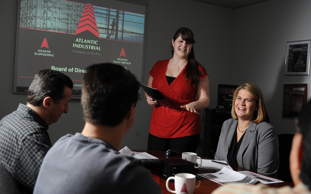 Professionals at business meeting presentation