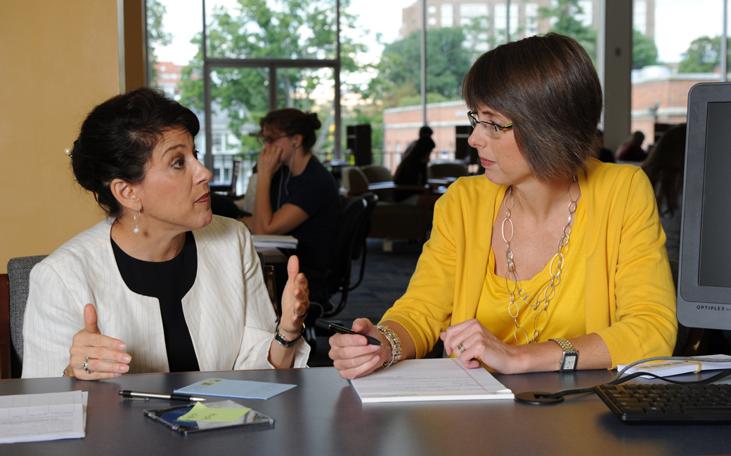 Two professionals talking during interview