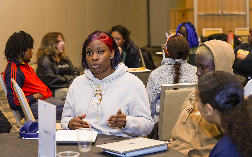A student participates in a TU Community Conversation.