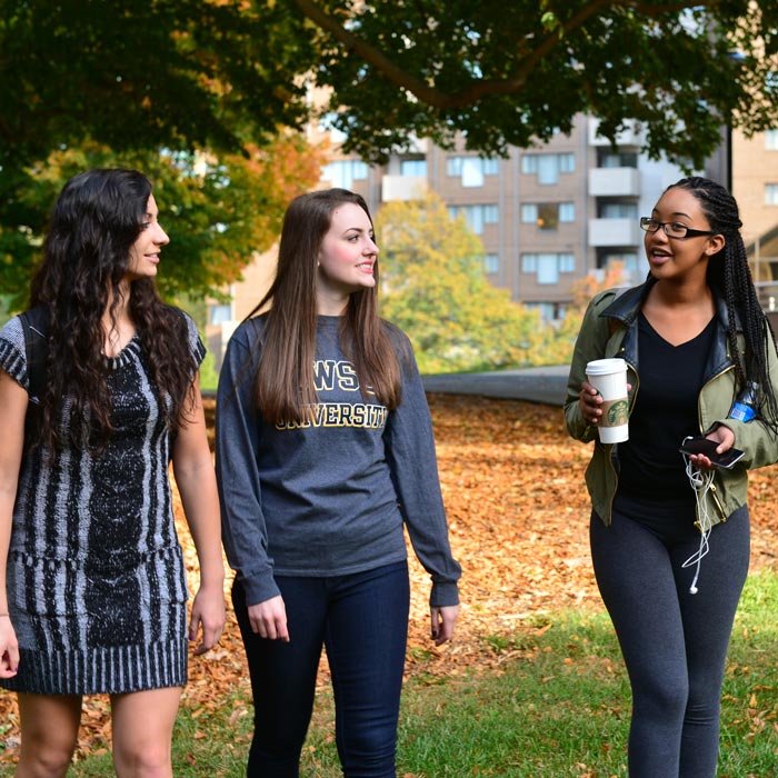 TU students walking on campus